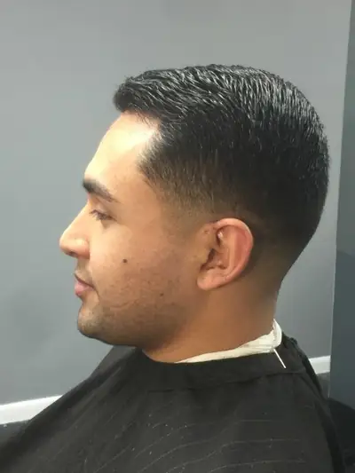 Clean taper fade with a sharp line up